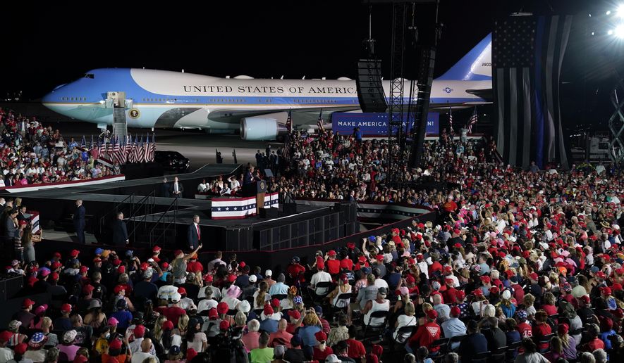 President Donald Trump speaks during a campaign rally at Orlando Sanford International Airport, Monday, Oct. 12, 2020, in Sanford, Fla. (AP Photo/Evan Vucci)