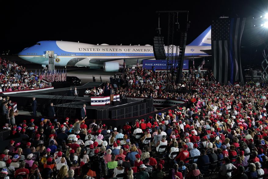 President Donald Trump speaks during a campaign rally at Orlando Sanford International Airport, Monday, Oct. 12, 2020, in Sanford, Fla. (AP Photo/Evan Vucci)
