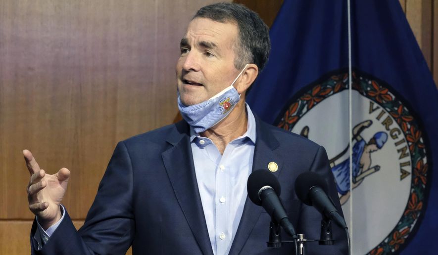 In this Sept. 1, 2020, photo, Virginia Gov. Ralph Northam answers a reporter&#39;s question during a news briefing in Richmond. (Bob Brown/Richmond Times-Dispatch via AP) **FILE**
