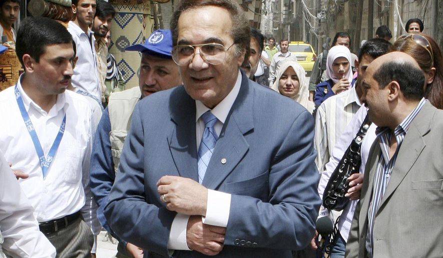 FILE - In this April 15, 2008 file photo, Egyptian actor Mahmoud Yassin, the Good Will Ambassador of the World Food Program, tours Sayyda Zeinab, one of Damascus's suburbs, to check the conditions of Iraqi refugees in Syria. Yassin died at the age of 79 on Oct. 14, 2020. (AP Photo/Bassem Tellawi, File)