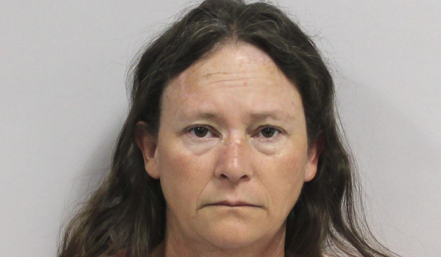 This undated photo provided by the Dent County Sheriff's Office in Salem, Mo., shows Susan Abney. Abney and her husband Randall Abney, are jailed on $500,000 bond on a charge of abuse or neglect of a child resulting in death. The charge was filed after the Oct. 3, 2020, death of their daughter, who was identified in court records by her initials of JAA. (Dent County Sheriff's Office via AP)