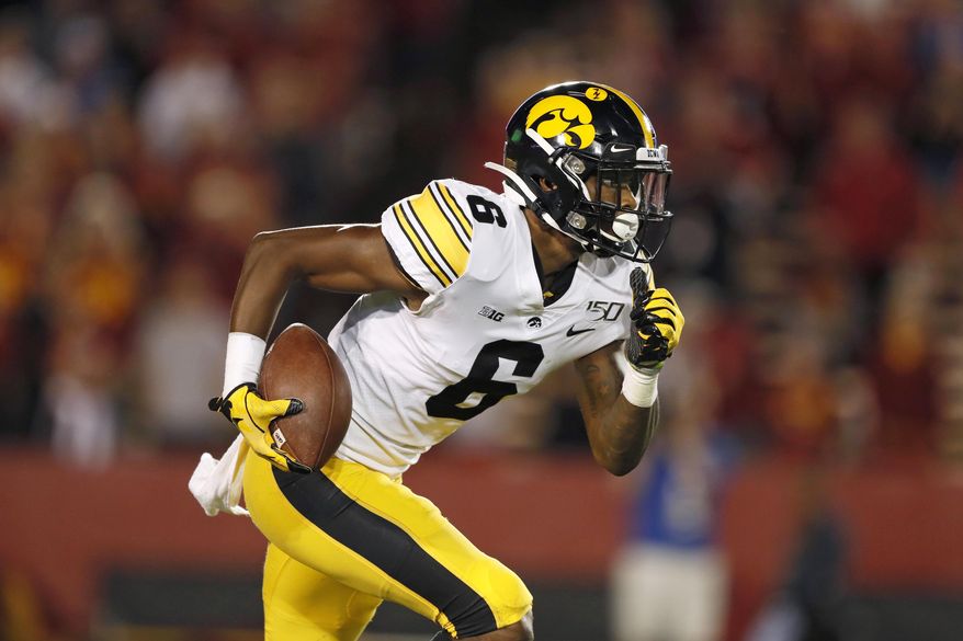 FILE - In this Sept. 14, 2019, file photo, Iowa wide receiver Ihmir Smith-Marsette returns a kickoff during the second half of an NCAA college football game against Iowa State in Ames, Iowa. (AP Photo/Charlie Neibergall, File)
