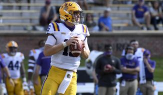 LSU quarterback Myles Brennan looks to pass during the second half of an NCAA college football game against Missouri Saturday, Oct. 10, 2020, in Columbia, Mo. Missouri upset LSU 45-41. (AP Photo/L.G. Patterson)