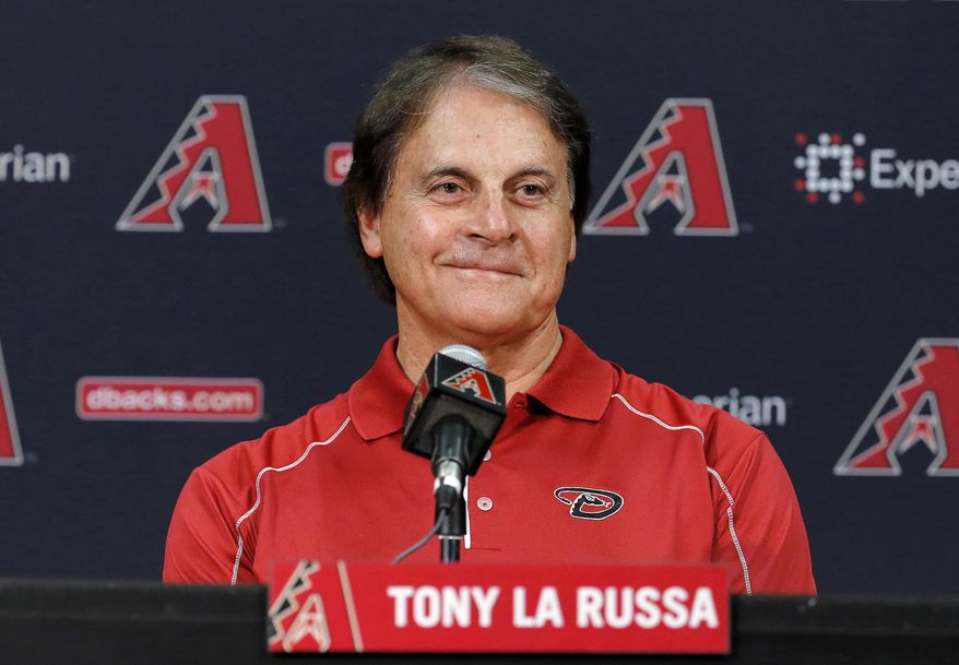 FILE - In this May 17, 2014, file photo, Tony La Russa, newly hired as chief baseball officer for the Arizona Diamondbacks, speaks to reporters after being introduced in Phoenix. The Los Angeles Angels granted the Chicago White Sox permission to interview Hall of Famer Tony La Russa for their managing job, a person familiar with the situation said Wednesday, Oct. 14, 2020. A three-time World Series-winning manager, the 76-year-old La Russa joined the Angels prior to this season as senior advisor of baseball operations. (AP Photo/Matt York, File)
