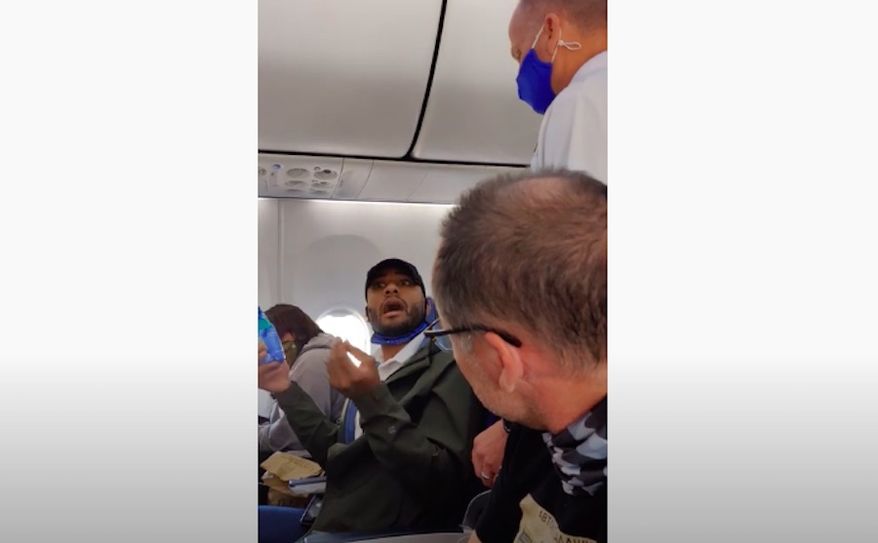 Donald Trump Jr. on Tuesday slammed a "disgusting" video that showed a Black man in pro-Trump gear being kicked off a Southwest flight for allegedly breaking the airline's mask policy. (Screengrab via YouTube/@KrisAnne Hall JD)