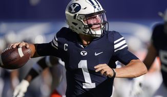 BYU quarterback Zach Wilson (1) throws downfield against UTSA in the second half during an NCAA college football game Saturday, Oct. 10, 2020, in Provo, Utah. (AP Photo/Rick Bowmer, Pool)