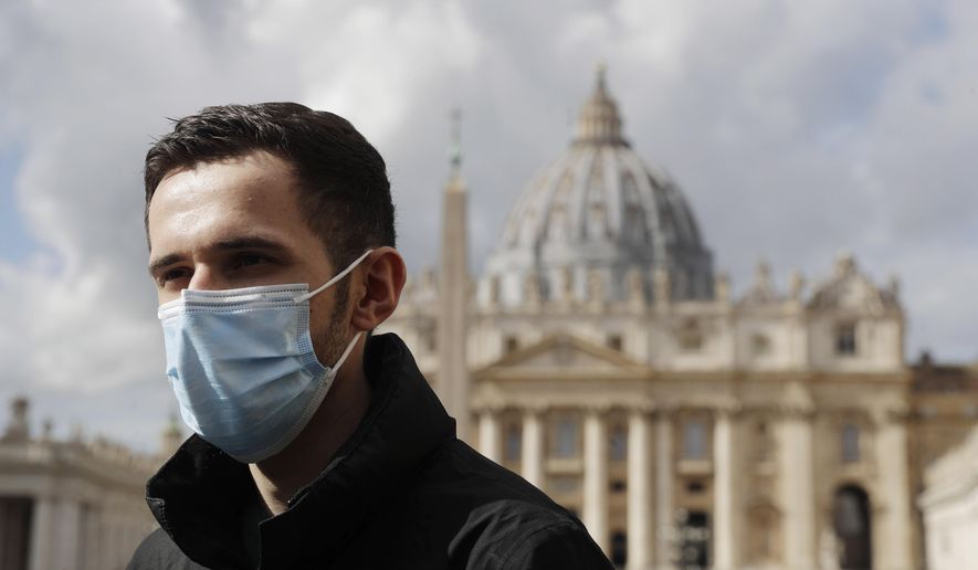 Whistleblower Kamil Jarzembowski meets journalists outside St. Peter's Square at the Vatican, Wednesday, Oct. 14, 2020. Two priests are going on trial in the Vatican’s criminal tribunal this week, one accused of sexually abusing an altar boy who served at papal Masses in St. Peter’s Basilica, and the other accused of covering it up. The proceedings starting Wednesday were forced on the Holy See after victims and Jarzembowski went public in 2017. (AP Photo/Gregorio Borgia)