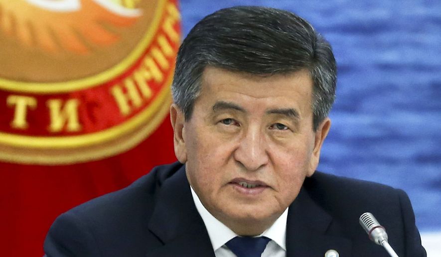In this file photo taken on Friday, Aug. 9, 2019, Kyrgyzstan&#39;s President Sooronbai Jeenbekov speaks at the Eurasian Economic Union Intergovernmental Council in Cholpon-Ata, Kyrgyzstan. The president of Kyrgyzstan announced his resignation in a bid to end the turmoil that has engulfed the Central Asian nation after a disputed parliamentary election. In a statement Thursday, Oct. 15, 2020, released by his office. (Yekaterina Shtukina, Sputnik, Government Pool Photo via AP, File)
