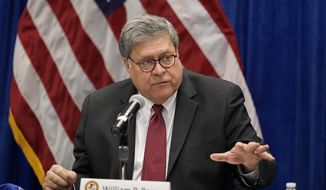 U.S.Attorney General William Barr speaks during a roundtable discussion on Operation Legend, a federal program to help cities combat violent crime, Thursday, Oct. 15, 2020, in St. Louis. (AP Photo/Jeff Roberson) **FILE**