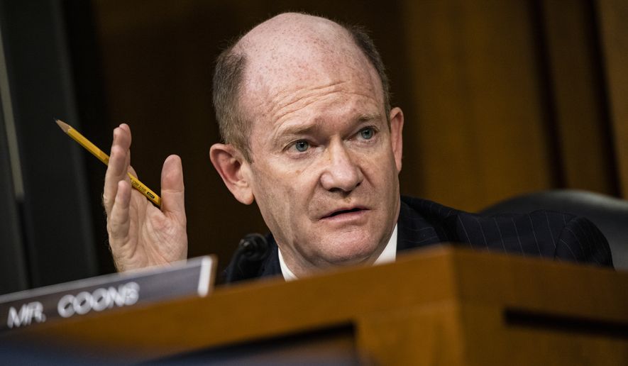 Sen. Chris Coons, D-Del., speaks during the confirmation hearing for Supreme Court nominee Amy Coney Barrett, before the Senate Judiciary Committee, Thursday, Oct. 15, 2020, on Capitol Hill in Washington. (Samuel Corum/Pool via AP)