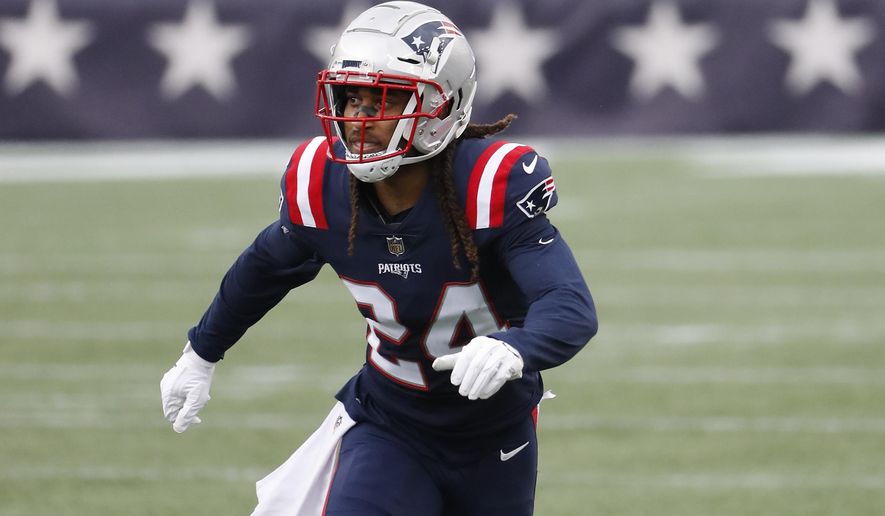 New England Patriots cornerback Stephon Gilmore plays during an NFL football game against the Las Vegas Raiders at Gillette Stadium, Sunday, Sept. 27, 2020 in Foxborough, Mass. Maybe the third time will actually bring a kickoff between for the Denver Broncos and New England Patriots. After having their original Week 5 matchup twice postponed because of a mini outbreak of coronavirus cases on the Patriots that saw four players including quarterback Cam Newton and reigning Defensive Player of the Year Stephon Gilmore test positive, the teams are hopeful they will finally meet this week. (AP Photo/Winslow Townson)