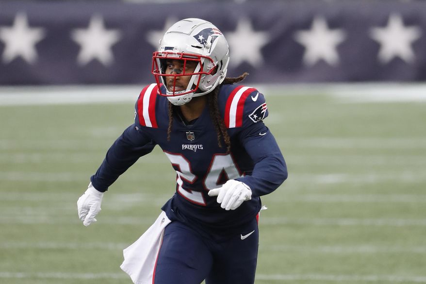 New England Patriots cornerback Stephon Gilmore plays during an NFL football game against the Las Vegas Raiders at Gillette Stadium, Sunday, Sept. 27, 2020 in Foxborough, Mass. Maybe the third time will actually bring a kickoff between for the Denver Broncos and New England Patriots. After having their original Week 5 matchup twice postponed because of a mini outbreak of coronavirus cases on the Patriots that saw four players including quarterback Cam Newton and reigning Defensive Player of the Year Stephon Gilmore test positive, the teams are hopeful they will finally meet this week. (AP Photo/Winslow Townson)