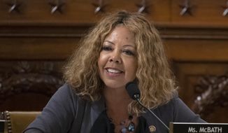 U.S. Rep. Lucy McBath, shown in a Thursday Dec. 12, 2019 file photo on Capitol Hill in Washington, is seeking re-election in suburban Atlanta’s 6th Congressional District. She debated Tuesday with her general election opponent, Republican Karen Handel, who McBath narrowly beat in 2018 to claim the seat in an affluent district that includes parts of Cobb, Fulton and DeKalb counties. (Alex Edelman/Pool via AP)