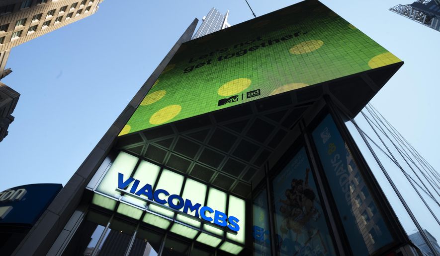 FILE - The ViacomCBS headquarters is shown in New York's Times Square on Aug. 5, 2020. CBS News is rebuilding MTV's old "Total Request Live" studio as its headquarters for election night. The network is installing giant touchscreens and "augmented reality" displays for the big political night and says the studio provides extra roominess to put on a television show in the COVID-19 era. (AP Photo/Mark Lennihan, File)