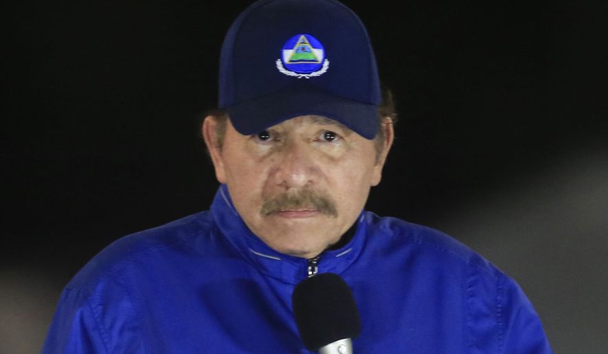 FILE - In this March 21, 2019 file photo, Nicaragua&#39;s President Daniel Ortega speaks during the inauguration ceremony of a highway overpass in Managua, Nicaragua. The Central American nation&#39;s National Assembly approved a controversial law Thursday, Oct. 15, 2020, that would give the government of President Ortega more power to monitor people, businesses and organizations that receive funding from overseas. (AP Photo/Alfredo Zuniga, File)