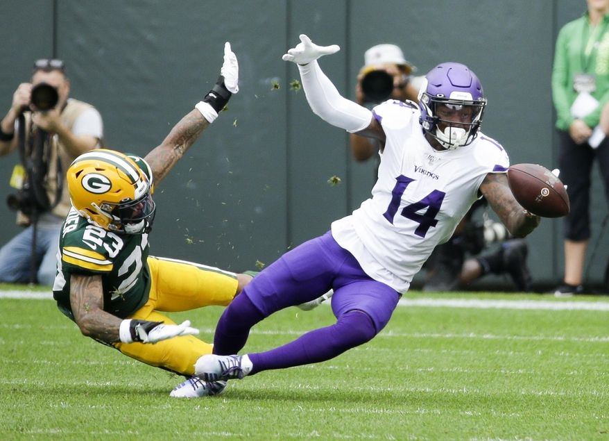 FILE - In this Sept. 15, 2019, file photo, Green Bay Packers&#x27; Jaire Alexander, left, breaks up a pass intended for Minnesota Vikings&#x27; Stefon Diggs during the first half of an NFL football game in Green Bay, Wis. Alexander believes his meditation sessions have helped him develop into one of the game’s top young shutdown corners. (AP Photo/Mike Roemer, File)
