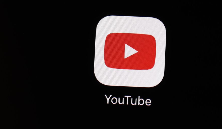 This March 20, 2018, file photo shows the YouTube app on an iPad in Baltimore. (AP Photo/Patrick Semansky, File)
