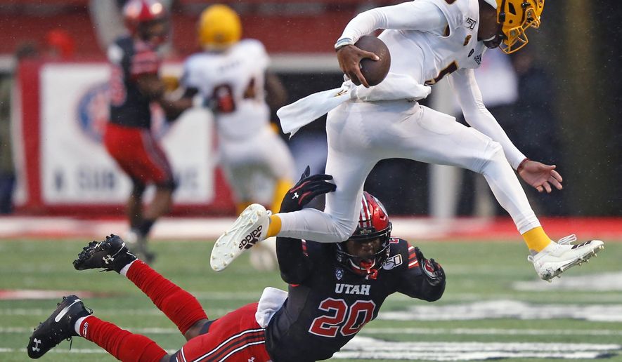 FILE - In this Oct. 19, 2019, file photo, Utah linebacker Devin Lloyd (20) tackles Arizona State quarterback Jayden Daniels (5) during the first half of an NCAA college football game in Salt Lake City. Experience is in short supply on the Utah defense as it prepares to head into the pandemic-shortened season. The Utes return only two full-time starters – junior defensive end Mika Tafua and junior linebacker Lloyd – from a unit that took the Pac-12 by storm a year ago. (AP Photo/Rick Bowmer)
