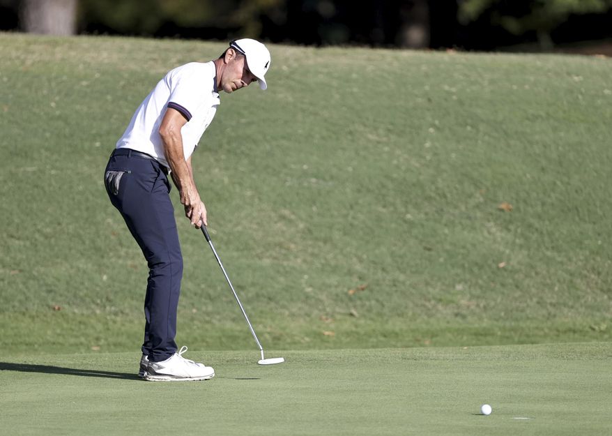 Mike Weir looks on his birdie putt in the 18th hole during the second round of Dominion Energy Charity Classic golf tournament at The Country Club of Virginia in Richmond, Va., Saturday, Oct. 17, 2020. (Daniel Sangjib Min/Richmond Times-Dispatch via AP)