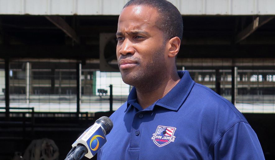 In this Monday, June 22, 2020, file photo, Republican U.S. Senate candidate John James speaks at Weir Farms in Hanover Township, Mich. First-term Democratic Sen. Gary Peters of Michigan is trying to hang onto his seat. The low-key, understated, maybe even “boring” senator is betting voters care more about his effectiveness as he desperately fights to keep a seat his party is counting on to take the Senate majority. Peters is finding it tougher to shake Republican John James. Michigan has something it has not seen in 20 years: a competitive Senate contest.  (AP Photo/David Eggert, File)  **FILE**