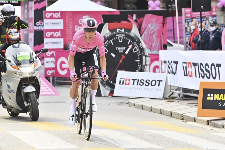 Portugal's Joao Almeida competes during the 14th stage of the Giro d'Italia cycling race, an individual time trial from Conegliano to Valdobbiadene, Italy, Saturday, Oct. 17, 2020. (Massimo Paolone/LaPresse via AP)