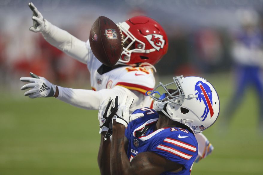 Kansas City Chiefs safety Juan Thornhill (22) breaks up a pass to Buffalo Bills&#x27; John Brown (15) during the first half of an NFL football game, Monday, Oct. 19, 2020, in Orchard Park, N.Y. (AP Photo/Jeffrey T. Barnes)