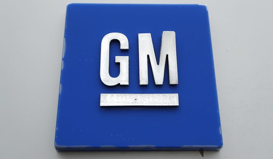 This Monday, Jan. 27, 2020, photo shows the General Motors logo. General Motors is expected to reveal that it will build the Cadillac Lyriq electric SUV at its factory in Spring Hill, Tenn., when it makes a major manufacturing announcement Tuesday, Oct. 20, 2020. (AP Photo/Paul Sancya)
