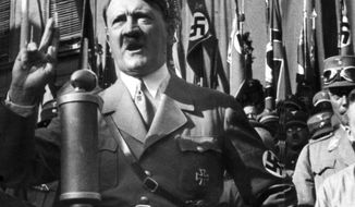 FILE - An undated file picture shows the leader of the National Socialists Adolf Hitler, gesturing during a speech. A prominent European Jewish organization is criticizing a Munich auction house’s decision to sell several of Nazi dictator Adolf Hitler’s handwritten speeches, saying it “defies logic, decency and humanity” to put them on the market(dpa via AP, file)