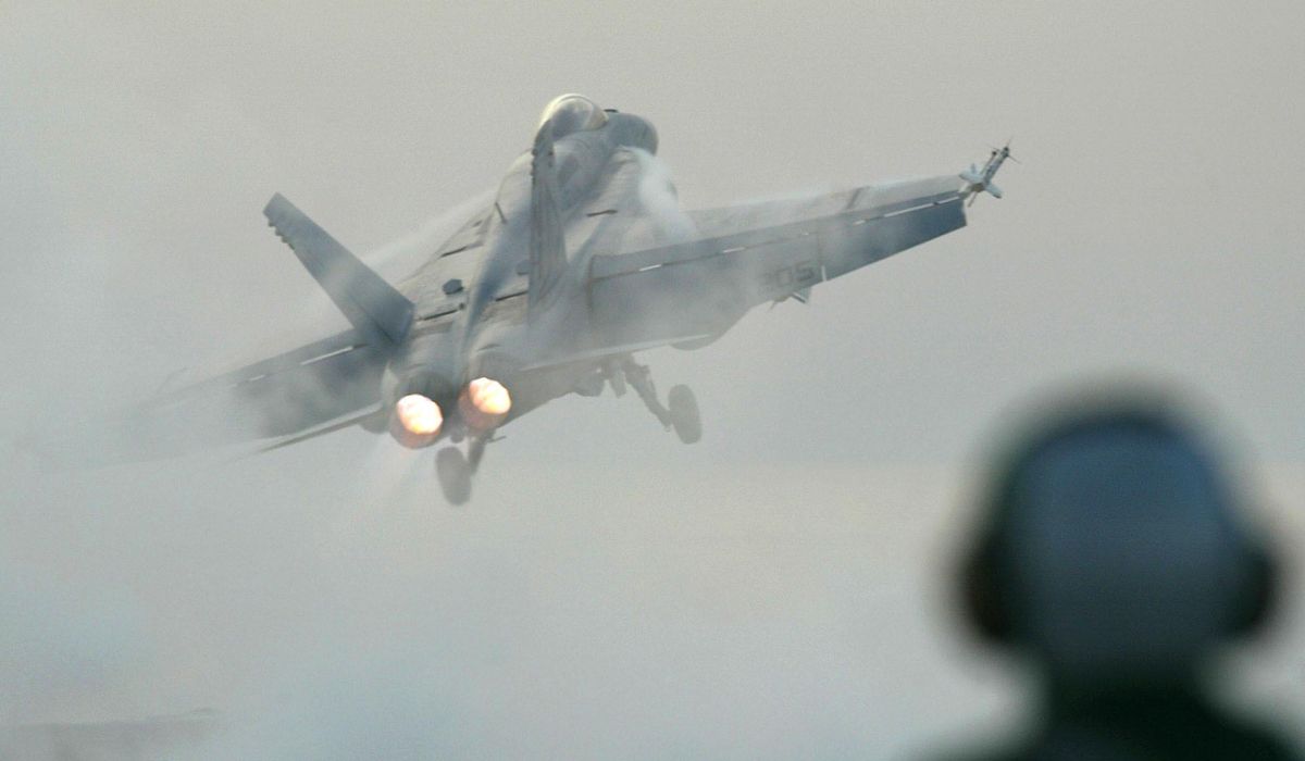 NextImg:Ejected Navy pilot rescued off Virginia coast after fighter jet crash