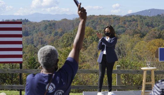 Democratic vice presidential candidate Sen. Kamala Harris, D-Calif., applauds supporters during her appearance at UNC-Asheville, Wednesday, Oct. 21, 2020, in Asheville, N.C. (AP Photo/Kathy Kmonicek)