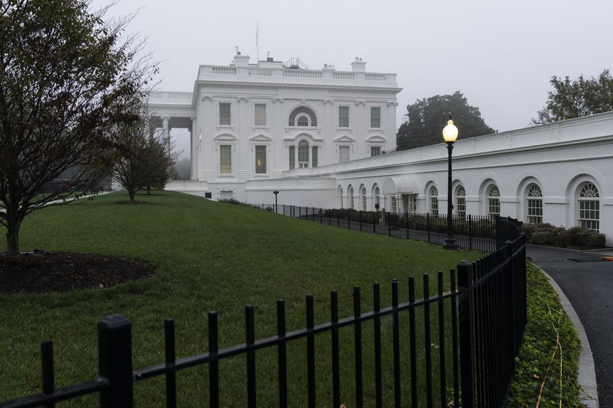 A light fog surrounds the White House, Wednesday, Oct. 21, 2020, in Washington. (AP Photo/Alex Brandon)