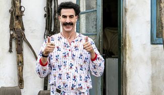 This image released by Amazon Studios shows Sacha Baron Cohen in a scene from &quot;Borat Subsequent Moviefilm.&quot; (Amazon Studios via AP)