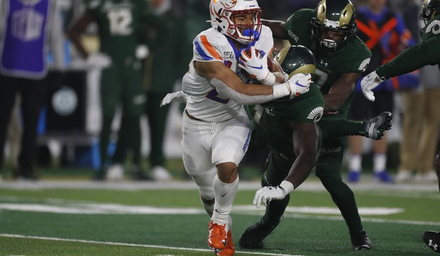 Boise State running back George Holani (24) runs in the second half of an NCAA college football game againsy Colorado State, Friday, Nov. 29, 2019, in Fort Collins, Colo. Holani was the Mountain West freshman of the year last season after rushing for 1,014 yards and seven touchdowns. (AP Photo/David Zalubowski)