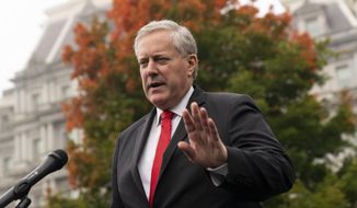 White House chief of staff Mark Meadows speaks with reporters at the White House, Wednesday, Oct. 21, 2020, in Washington. (AP Photo/Alex Brandon)