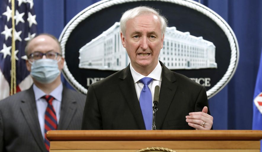 Then-Deputy Attorney General Jeffrey A. Rosen holds a news conference to announce the results of the global resolution of criminal and civil investigations with an opioid manufacturer at the Justice Department in Washington, Wednesday, Oct. 21, 2020. (Yuri Gripas/Pool via AP) ** FILE **