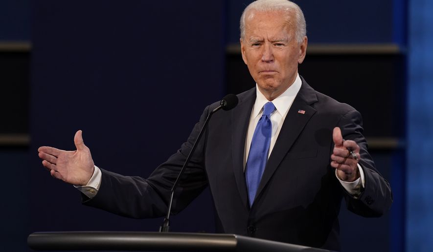 Democratic presidential candidate former Vice President Joe Biden gestures while speaking during the second and final presidential debate Thursday, Oct. 22, 2020, at Belmont University in Nashville, Tenn. (AP Photo/Patrick Semansky)
