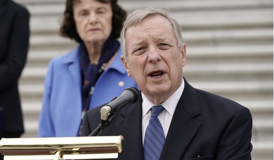 Sen. Dick Durbin, D-Ill., speaks during a news conference after boycotting the vote by the Republican-led panel to advance the nomination of Judge Amy Coney Barrett to sit on the Supreme Court, Thursday, Oct. 22, 2020, at the Capitol in Washington, as Senate Judiciary Committee ranking member Sen. Dianne Feinstein, D-Calif., and other Democratic committee members look on. (AP Photo/J. Scott Applewhite)