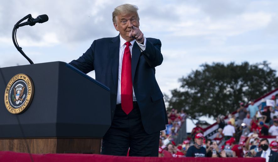President Donald Trump arrives for a campaign rally at The Villages Polo Club, Friday, Oct. 23, 2020, in The Villages, Fla. (AP Photo/Evan Vucci)