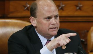 FILE - In this June 4, 2013 file photo, Rep. Tom Reed, R-N.Y., asks a question during the House Ways and Means Committee hearing on Capitol Hill in Washington. The upstate New York congressman said he and his family were threatened after a dead animal and a brick bearing a family member&#39;s name were found at his home on Friday, Oct. 23, 2020. (AP Photo/Charles Dharapak, File)