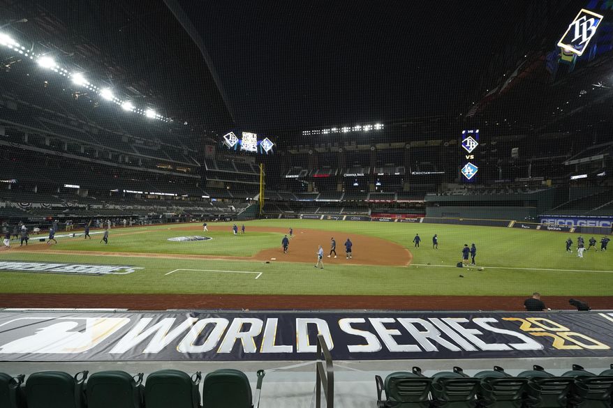 CORRECTS DATE TO MONDAY, OCT. 19, 2020 - The Tampa Bay Rays practice at Globe Life Field as the team prepares for the baseball World Series against the Los Angeles Dodgers, in Arlington, Texas, Monday, Oct. 19, 2020. (AP Photo/Eric Gay)