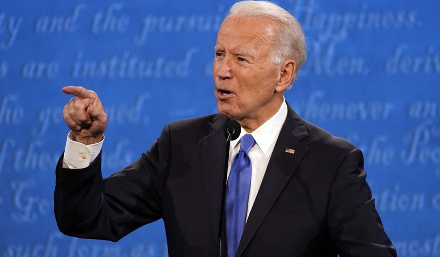 Democratic presidential candidate former Vice President Joe Biden speaks during the second and final presidential debate Thursday, Oct. 22, 2020, at Belmont University in Nashville, Tenn., with President Donald Trump. (AP Photo/Julio Cortez)