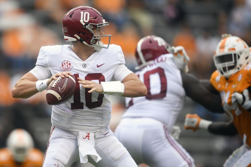 Alabama quarterback Mac Jones (10) lines up a pass against Alabama during an NCAA college football game in Knoxville, Tenn., Saturday, Oct. 24, 2020. (Caitie McMekin/Knoxville News Sentinel via AP)