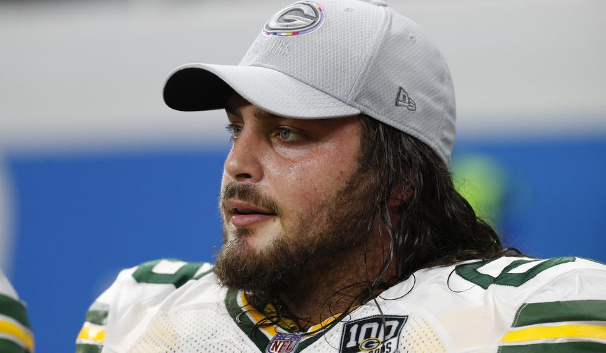FILE - In this Oct. 7, 2018 file photo, Green Bay Packers offensive tackle David Bakhtiari watches during an NFL football game against the Detroit Lions in Detroit. Bakhtiari won’t play Sunday, Oct. 25, 2020 against the Houston Texans due to a chest injury. The Pro Bowl lineman hadn’t practiced all week and was listed as questionable in the team’s Friday injury report. (AP Photo/Paul Sancya, File)