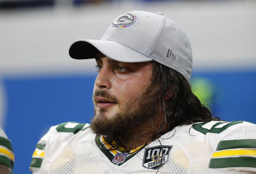 FILE - In this Oct. 7, 2018 file photo, Green Bay Packers offensive tackle David Bakhtiari watches during an NFL football game against the Detroit Lions in Detroit. Bakhtiari won’t play Sunday, Oct. 25, 2020 against the Houston Texans due to a chest injury. The Pro Bowl lineman hadn’t practiced all week and was listed as questionable in the team’s Friday injury report. (AP Photo/Paul Sancya, File)