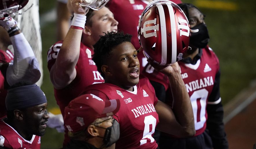 Indiana quarterback Michael Penix Jr. (9) celebrates after Indiana defeated Penn State in overtime of an NCAA college football game, Saturday, Oct. 24, 2020, in Bloomington, Ind. Indiana won 36-35 in overtime. (AP Photo/Darron Cummings)
