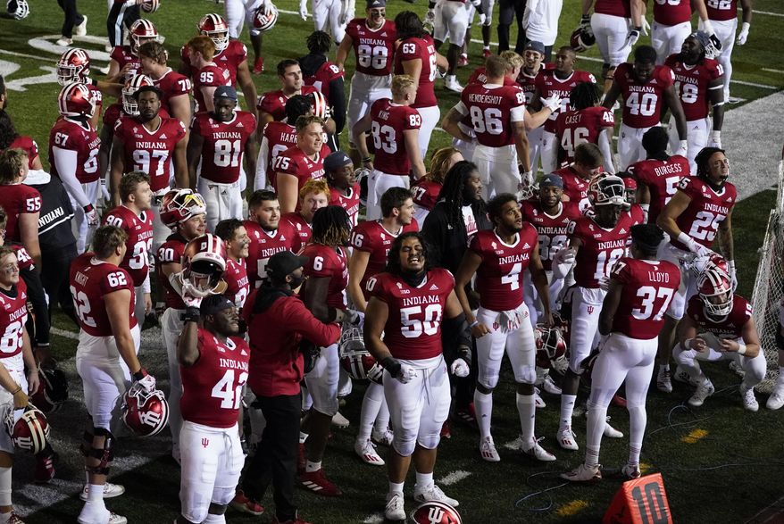 Indiana players celebrate after defeating Penn State in overtime of an NCAA college football game, Saturday, Oct. 24, 2020, in Bloomington, Ind. Indiana won 36-35 in overtime. (AP Photo/Darron Cummings) **FILE**