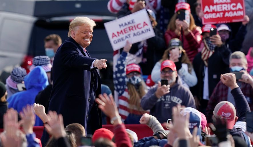 President Trump is running with a fundraising disadvantage against Democratic presidential nominee Joseph R. Biden, who is pulling in &quot;dark money&quot; from big donors. The Trump campaign, meanwhile, is focusing on an extensive ground operation. (Associated Press/File)