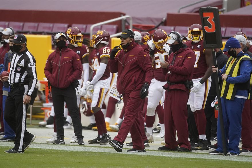 Washington Football Team head coach Ron Rivera on the sidelines during the first half of an NFL football game, Sunday, Oct. 25, 2020, in Landover, Md. (AP Photo/Al Drago)