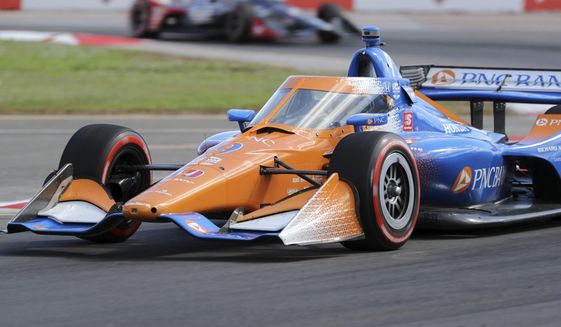 Scott Dixon drives into turn two during the IndyCar auto race Sunday, Oct. 25, 2020, in St. Petersburg, Fla. (AP Photo/Mike Carlson)