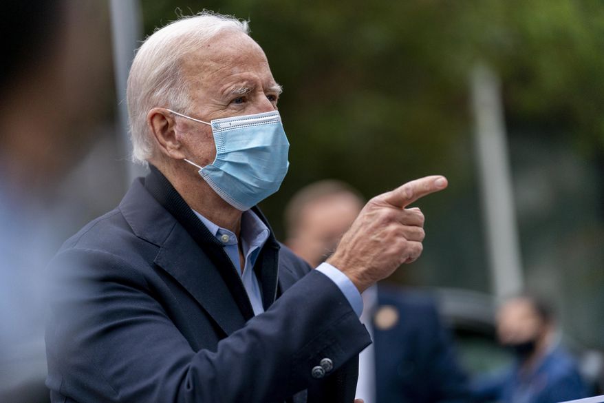Democratic presidential candidate former Vice President Joe Biden speaks to members of the media outside a voter service center, Monday, Oct. 26, 2020, in Chester, Pa. (AP Photo/Andrew Harnik)